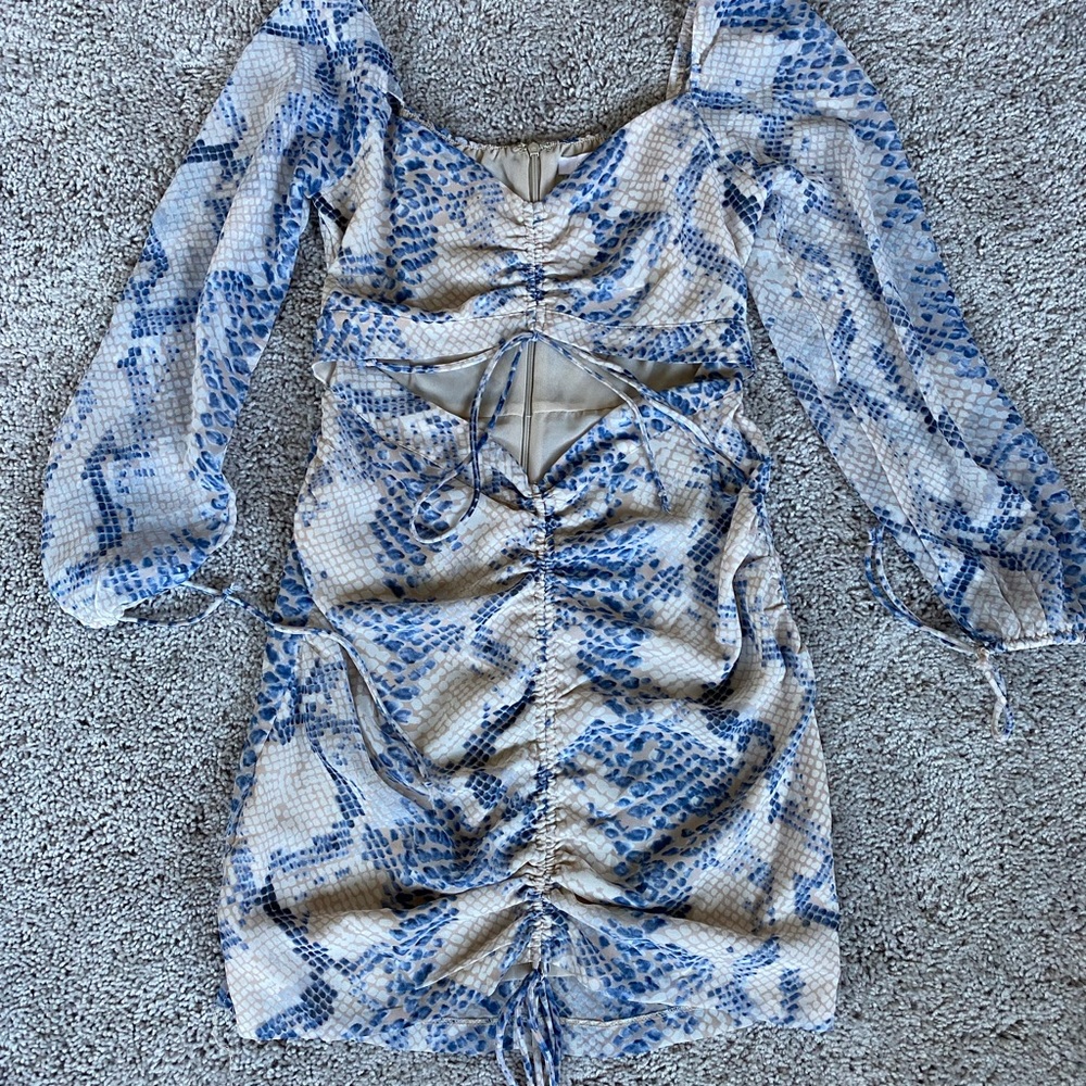 White and blue snake skin cut out dress
